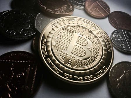 Crypto currency physical gold bitcoin coin near money. Financial concept.の写真素材