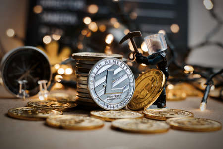 Crypto currency physical metal Litecoin coin. Christmas mining concept.の写真素材