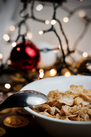 Delicious and fresh corn flakes in white bowl. Christmas food concept.の写真素材