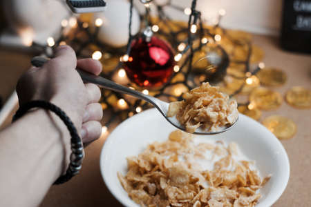 Delicious and fresh corn flakes in white bowl. Christmas food concept.の写真素材