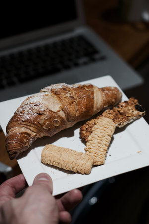 Delicious and fresh crossaint in the kitchen. Sweet food concept.