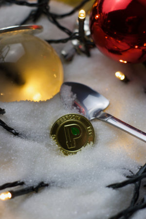Digital currency physical gold metal peercoin coin. Christmas concept.の写真素材