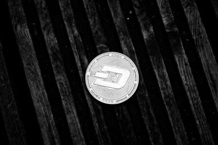 Digital currency physical metal silver dashcoin coin. Outdoor concept.の写真素材
