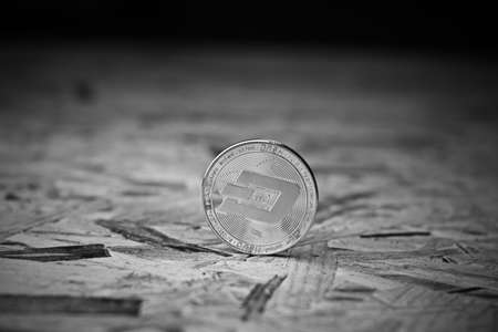 Digital currency physical metal silver dash coin. Cryptocurrency concept.の写真素材