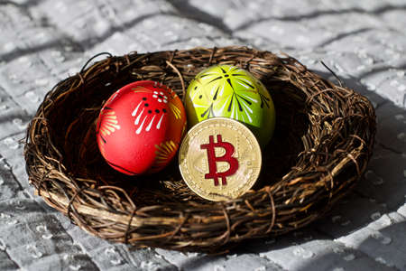 Digital currency physical metal bitcoin coin. Cryptocurrency easter concept.の写真素材