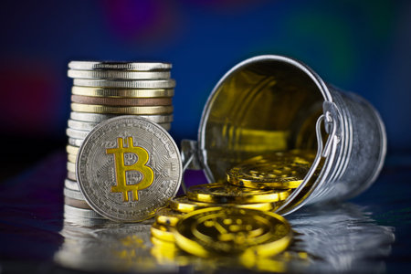 Digital currency physical metal bitcoin coin. Cryptocurrency gold concept.