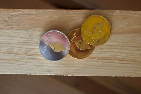 Digital currency physical ethereum coin. Cryptocurrency concept.の写真素材