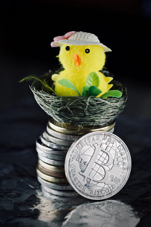 Digital currency physical metal bitcoin coin. Cryptocurrency easter concept.