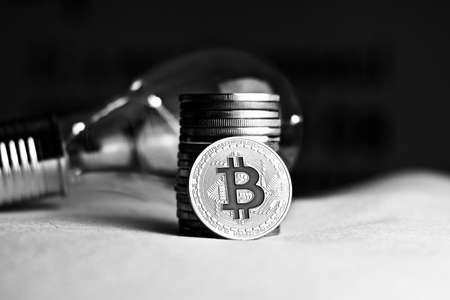 Digital currency physical metal bitcoin coin. Idea cryptocurrency concept.の写真素材