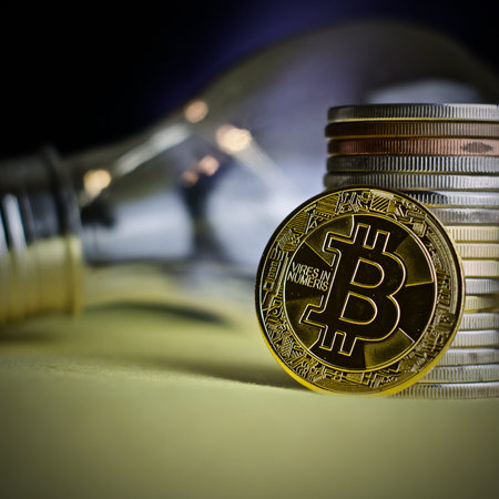 Digital currency physical metal bitcoin coin. Idea cryptocurrency concept.