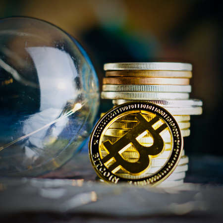 Digital currency physical metal bitcoin coin. Idea cryptocurrency concept.の写真素材
