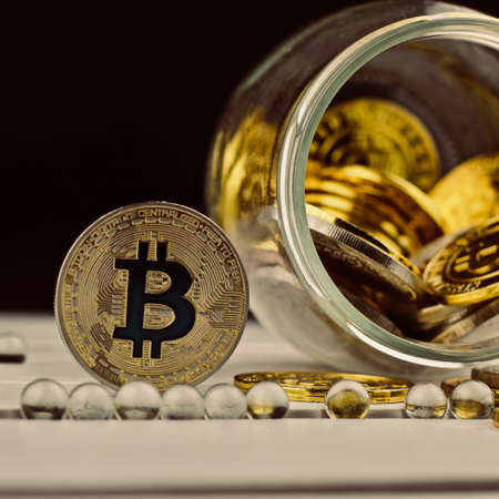 Digital currency physical metal bitcoin coin. Cryptocurrency savings concept.の写真素材