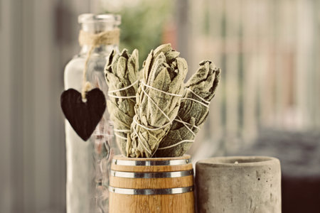 White salvia incense. Salvia ritual concept. White sage, scared sage, california sage, bee sage.の写真素材