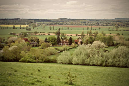 Green fields on spring time in England. Outdoor nature concept.の写真素材