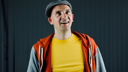 Bald young man in yellow tshirt. Tshirt mockup concept.の写真素材