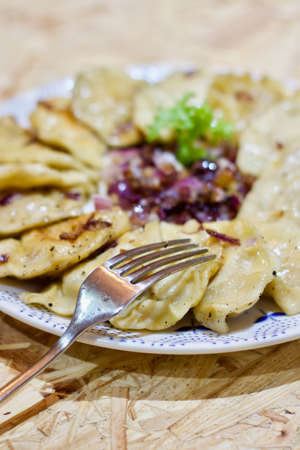 Delicious and fresh dumplings. Tasty lunch concept. Polish food.の写真素材