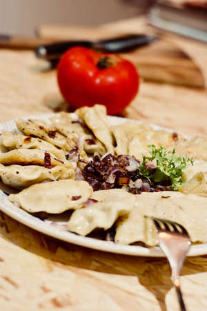Delicious and fresh dumplings. Tasty lunch concept. Polish food.の写真素材