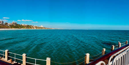 Summer time. Pier in Bornemouth, England. Blue water and sky. Travel. Panoramic view.の写真素材