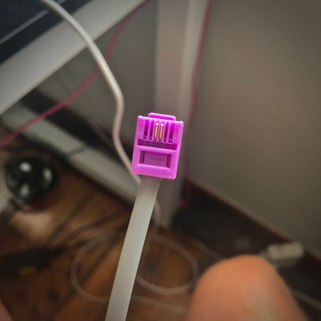 Telephone socket cable. Electronic concept.