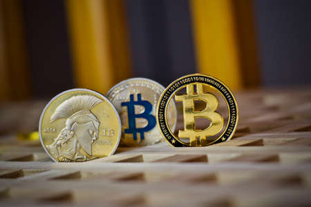 Digital currency physical metal bitcoin coin. Cryptocurrency business concept.の写真素材