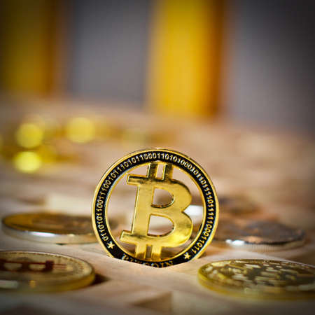 Digital currency physical metal bitcoin coin. Cryptocurrency business concept.の写真素材
