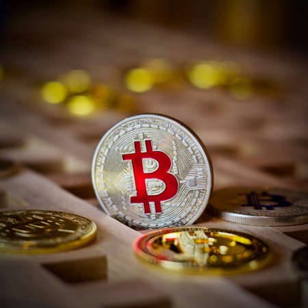 Digital currency physical metal bitcoin coin. Cryptocurrency business concept.の写真素材