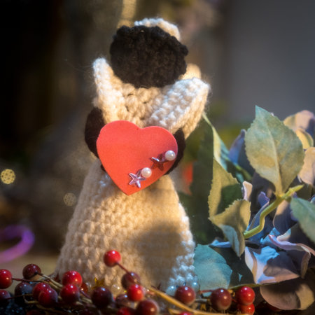 Beautiful wool handmade decoration. Knitting and crochet. Handmade crocheting crafts. DIY.
