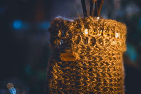 Beautiful wool handmade decoration. Knitting and crochet. Handmade crocheting crafts. DIY.の写真素材