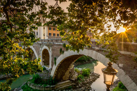 Ancient bridge in Rome Italy. Outdoor shot using natural light at sunset.の写真素材