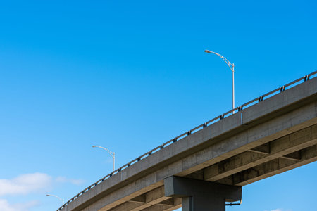 Bridge of the Quebec 440 Highway above Saint-Roch, Quebec city, under a blue sky.