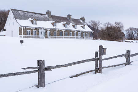 Saint-Joachim, Quebec, Canada â January 29, 2022: The old farm where are the administration of the Cap-Tourmente National Wildlife Area situated on the Beaupre coast at Saint-Joachim (Quebec, Canada).のeditorial素材