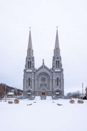 Sainte-Anne-de-BeauprÃ©, Quebec, Canada â January 29, 2022: The Basilica dedicated to St Anne of the Sainte-Anne-de-BeauprÃ© (Quebec, Canada)のeditorial素材