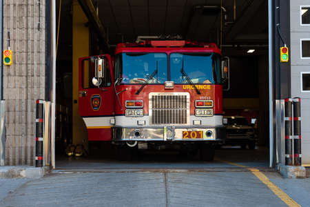 Quebec city, Quebec, Canada â May 23, 2021: With a fire truck, the facade of the fire station number 1 of the city of Quebec, on the Saint-Jean Street.のeditorial素材