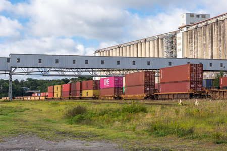 Halifax, Nova-Scotia, Canada â€“ September 4, 2021: Grain elevator and container train in the...