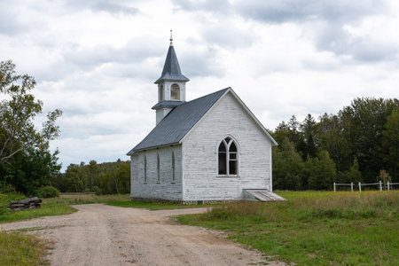 Prince William, New Brunswick, Canada â September 12, 2021: Catholic church of Kings Landing, an historic museum village of the settlement.のeditorial素材
