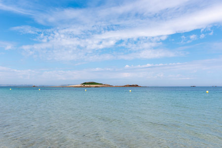 Dune beach (plage des dunes) and Brug island at Port-Blanc (Penvenan. Cotes-d'Armor, Brittany, France)の写真素材