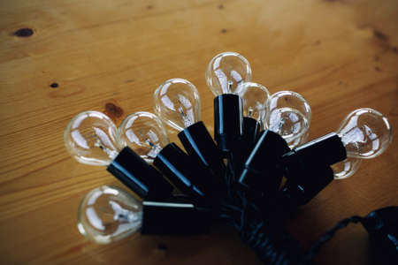 Led bulbs technology on a wooden backgroundの写真素材