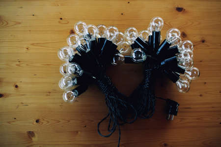 Led bulbs technology on a wooden backgroundの写真素材