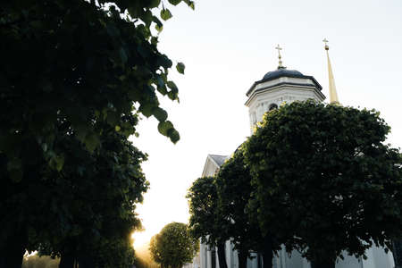Small russian church in park at sunsetの写真素材