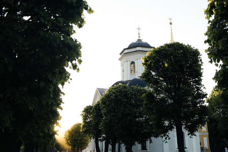 Small russian church in park at sunsetの写真素材