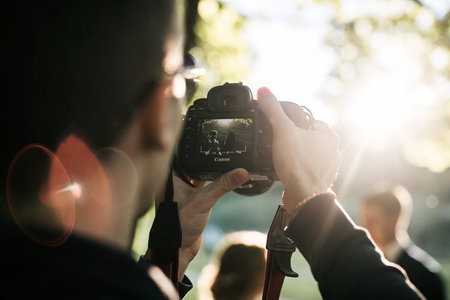 photographer shoots on Canon camera in summerのeditorial素材