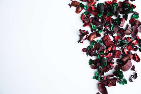 Flowers composition. Frame made of dried rose flowers on white background. Flat lay, top view, copy spaceの写真素材