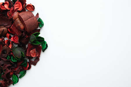 Flowers composition. Frame made of dried rose flowers on white background. Flat lay, top view, copy spaceの写真素材
