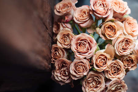 Beautiful autumn bouquet of pink roses. The work of the florist. Flower deliveryの写真素材