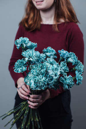 Beautiful bouquet of tinted dyed carnations. Flower deliveryの写真素材
