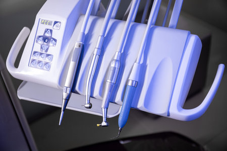 The workplace of the dentist with the dental unit and chair, close-up.