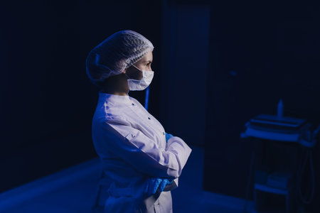 Portrait of Young Female Doctor in Medical Mask.