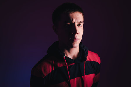 Young Man in a Jumper Dancing Contemporary Dance in Studio. Breakdancing. Dance School Poster. Copy...