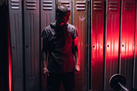 Man get ready for boxing training in the locker roomの写真素材