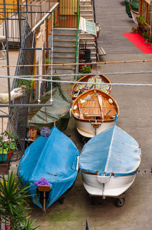 Manarola in the Cinque Terre, Italy. Beautiful seaside town and fishermen in Liguria, a popular tourist destination for sea holidays and tracking in unspoiled natureの写真素材